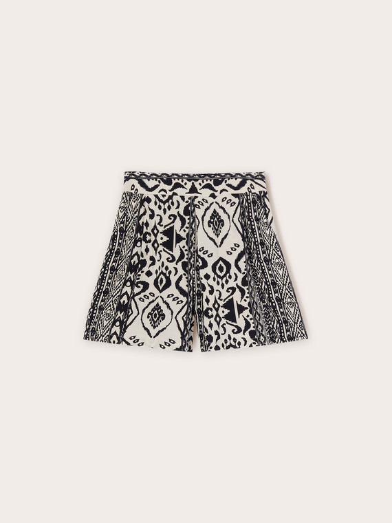 Shorts with ethnic pattern pleats