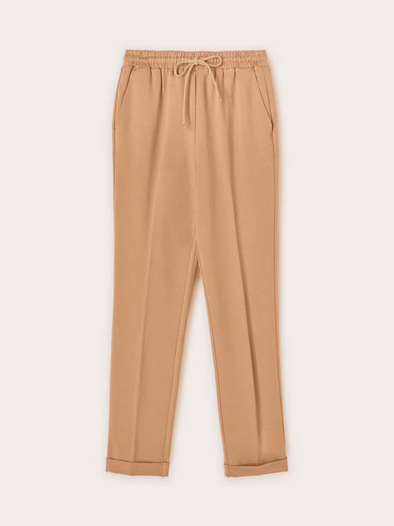 Jogging trousers with ironed crease