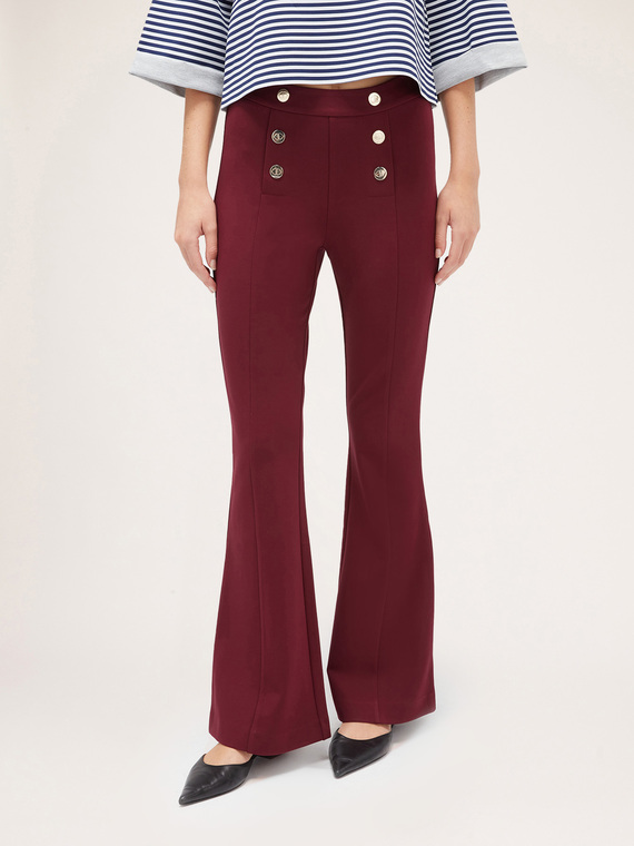 Milano knit fabric flare trousers button feature