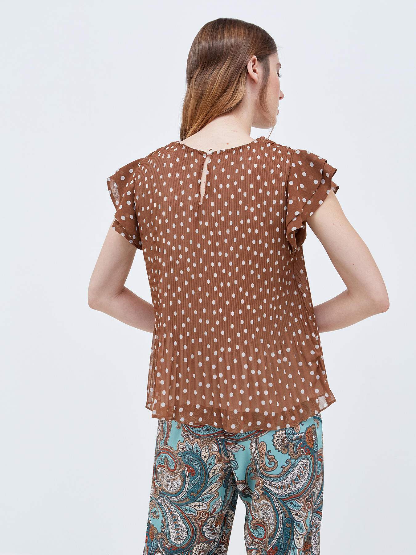 Pleated polka-dot blouse