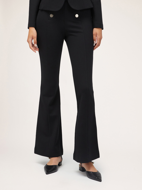 Milano knit fabric flare trousers button feature