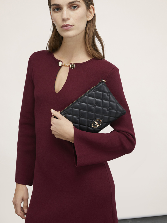 Flat clutch in quilted coated fabric