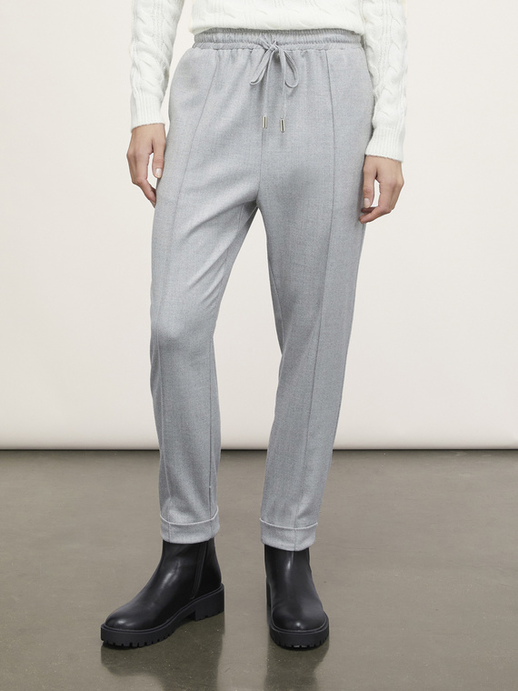 Jogging trousers with ironed crease