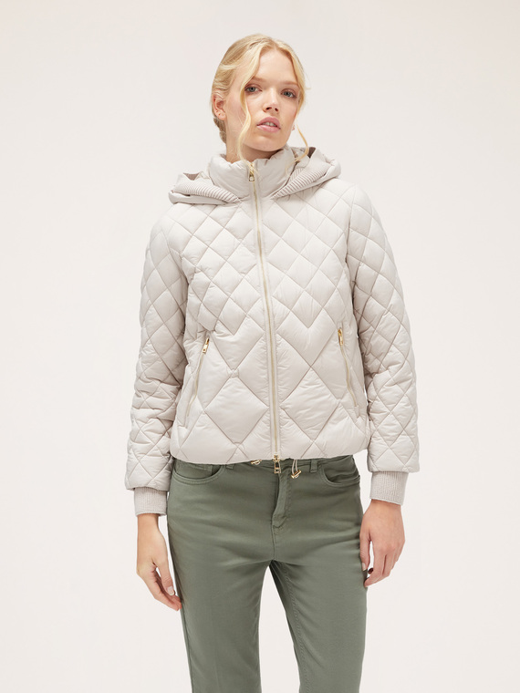 Padded jacket with hood and knit borders