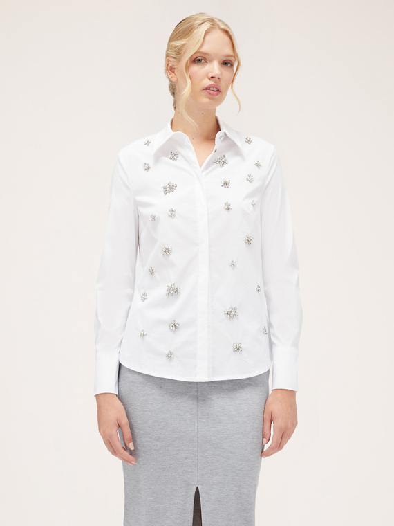 Shirt with applied gemstones